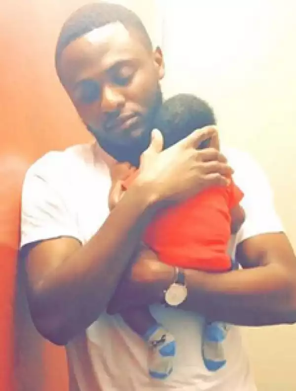 Ubi Franklin cradles newborn son in new photos